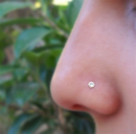 14k gold diamond nose stud.